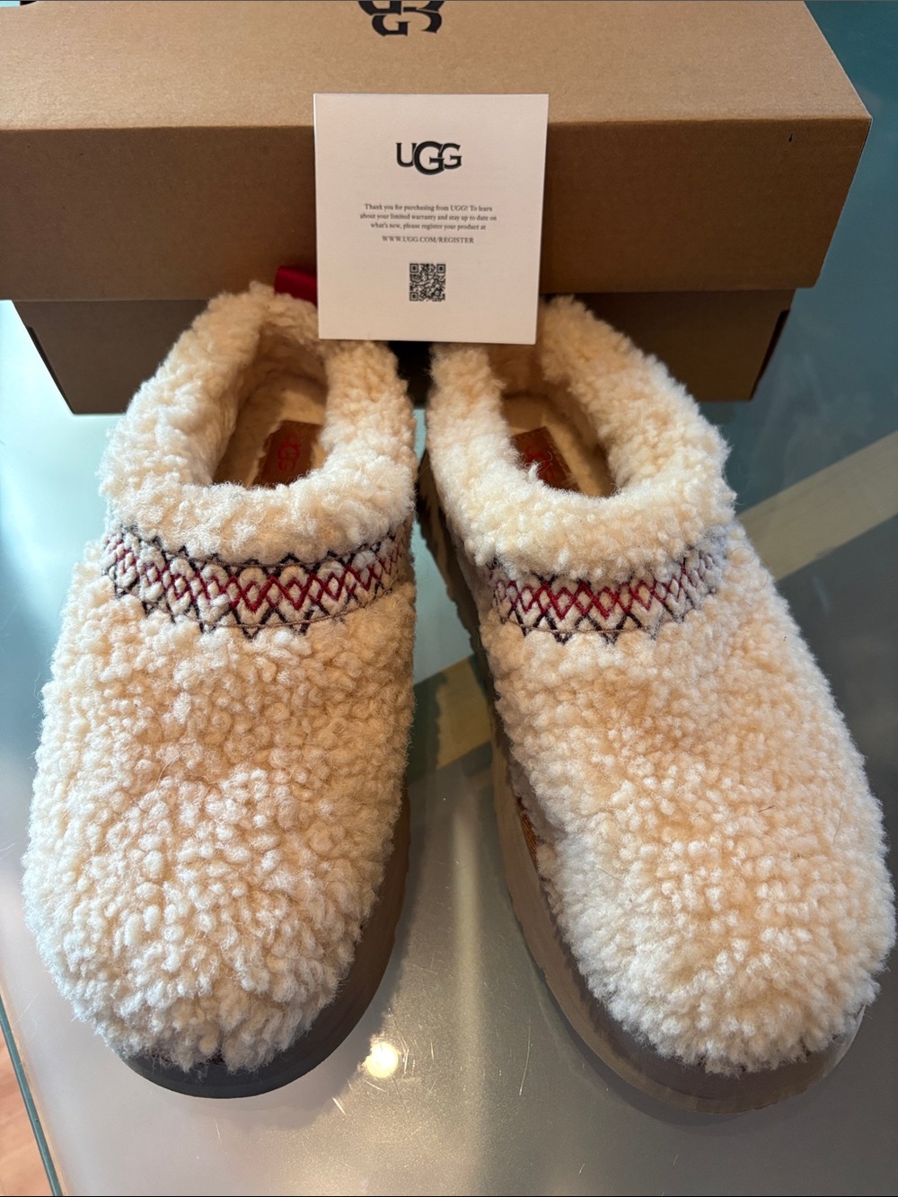 UGG Fuzzy Tasman with Braid slides in women’s size 8